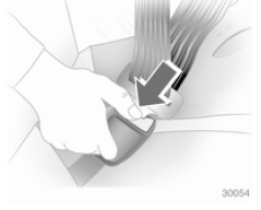 Pour détacher la ceinture, appuyer