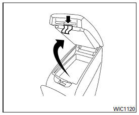 Pour ouvrir la partie supérieure du compartiment