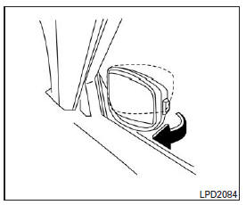 Pour rabattre le rétroviseur extérieur, poussez-le